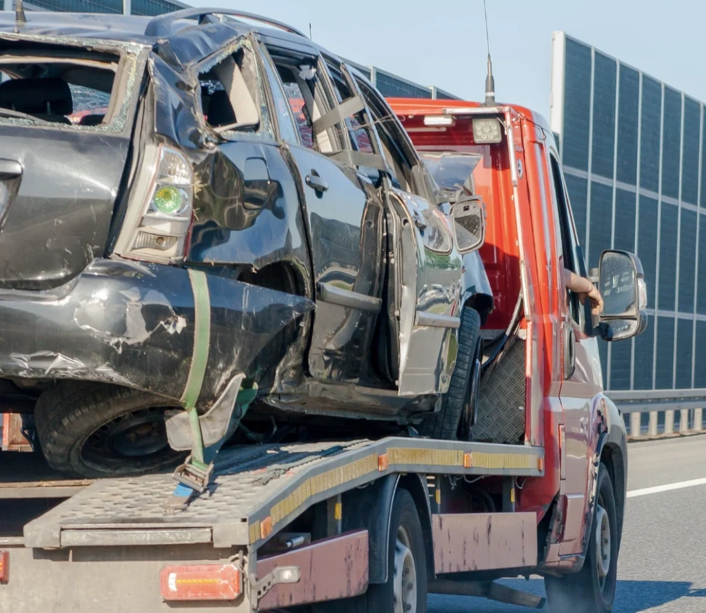 car being towed after a collision